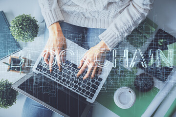 Aufkleber - Double exposure of woman hands working on computer and blockchain theme hologram drawing. Top View. bitcoin cryptocurrency concept.