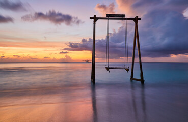 Sea swing at dawn