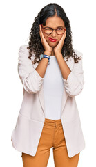 Canvas Print - Young african american girl wearing business clothes covering ears with fingers with annoyed expression for the noise of loud music. deaf concept.