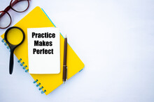 Practice Makes Perfect Concept Text On Notebook
