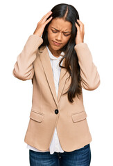 Poster - Beautiful hispanic woman wearing business jacket suffering from headache desperate and stressed because pain and migraine. hands on head.