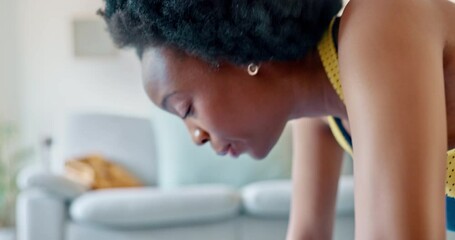 Canvas Print - Fitness exercise, tired breathing and black woman doing workout in living room, training for health and body goals in lounge of house. African girl with commitment doing cardio pushup for wellness