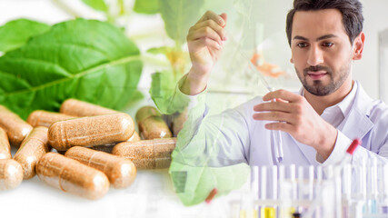 Wall Mural - scientist woman testing chemical sample in flask at laboratory with herbs capsule and herbal leaf. s