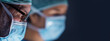 Diverse team of professional medical surgeons perform surgery in the operating room using high-tech equipment. Doctors work to save a patient in a modern hospital. Medicine, technology and healthcare.
