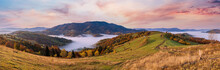 Morning Foggy Clouds In Autumn Mountain Countryside.  Ukraine, Carpathian Mountains, Transcarpathia. Peaceful Picturesque Traveling, Seasonal, Nature And Countryside Beauty Concept Scene.