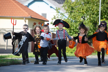 Happy group of kids on Halloween
