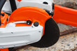 Petrol saw and cutter. Industrial manual power cutter with a abrasive cutting wheel