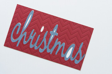 sign with christmas in blue and red