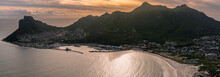 Sun Setting Behind The Sentinel Peak In Hout Bay, Cape Town