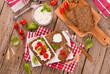 © Mi.Ti. - Rye bread with cottage cheese, basil and tomato.