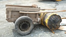 Wooden Cart And Dented Drum