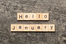 Hello January Word Written On Wood Block. Hello January Text On Table, Concept
