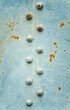 Old painted background with rivets