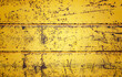 Yellow painted rusty background