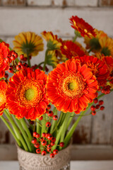 Fotomurales - Bouquet of orange gerbera daisies.