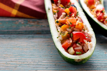 Canvas Print - Zucchini stuffed with vegetable salad.