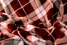 アーガイル模様の毛布の背景（赤と白）