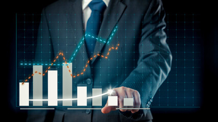 Wall Mural - Businessman draw finance allusive graph chart showing business profit growth increasing to future target . Excellent financial status of corporate business rise up . Finance and money technology .