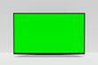 © Asisten junior - TV flat screen lcd or oled, plasma, realistic illustration, White blank monitor mockup. wide green screen monitor hanging on the wall