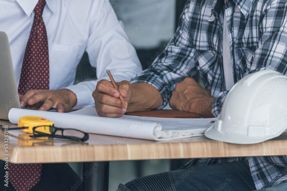 Contractor construction engineer meeting talking together on architect ...