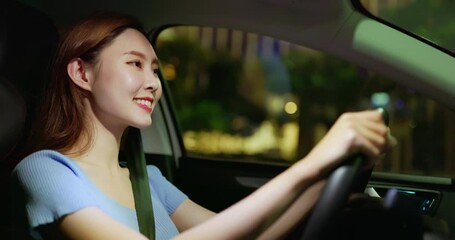 Wall Mural - woman is driving at night