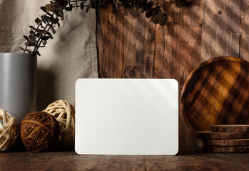 Fototapete - blank paper poster frame with kitchenware on wood table with sunlight
