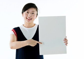 Wall Mural - Young asian woman showing blank board isolated on white background