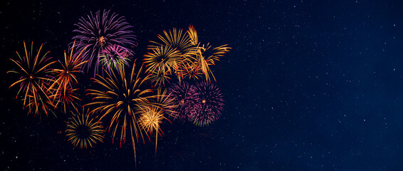 Wall Mural - fireworks with blur night sky background