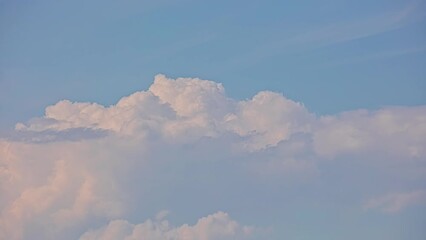 Wall Mural - Timelapse shot of blue sky with fluffy white clouds movement at daytime. Cumulus cloud.