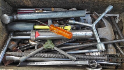 Object transportation background of an old wooden box contain old repairing tools for bike, motorbike or car