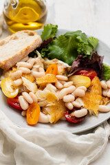 Poster - fried cod fish with white beans on the plate