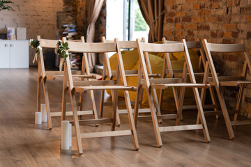 Wall Mural - rows of empty wooden chairs