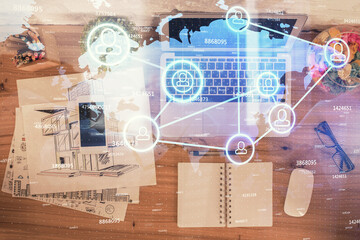 Poster - Social network hologram drawings over computer on the desktop background. Top view. Double exposure.