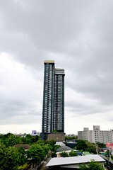 BANGKOK, THAILAND - September 26, 2022 : View of The top Modern Building with black Sky Background is in Bangkok, Thailand.