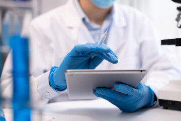 Wall Mural - health care researchers working in life science laboratory, medical science technology research work