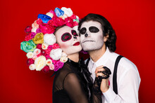 Profile Photo Of Charming Creepy Romantic Couple Man Lady Hold Hands Meet After Lifelong Parting Wear Black Dress Death Costume Roses Headband Suspenders Isolated Red Color Background