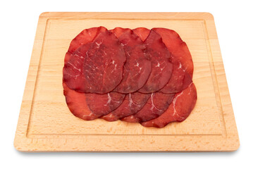 Poster - Bresaola slices, italian dried beef salami from Valtellina on wooden cutting board isolated on white