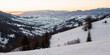 © Pellinni - carpathian rural landscape in winter. beautiful sunrise in mountains. snow covered hills. scenery with krasna ridge in the distance. synevir village in the valley