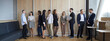 © Studio Romantic - Group of happy multiethnic people talk about work stuff, share news, and discuss latest events as they gather in modern office after corporate team meeting or business conference. Banner background