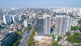 Fototapeta Na drzwi - Aerial view of the city of São Paulo, Brazil.
In the neighborhood of Vila Clementino, Jabaquara, south side. Aerial drone photo. Avenida 23 de Maio in the background