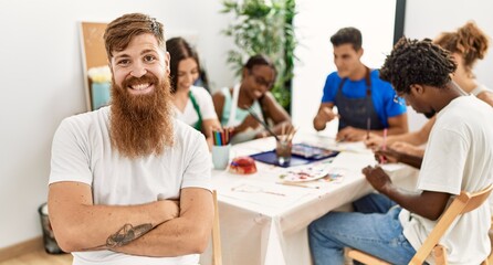 Sticker - Group of people drawing sitting on the table. Caucasian man smiling happy looking to the camera at art studio.