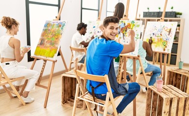 Sticker - Group of people smiling happy drawing at art studio.