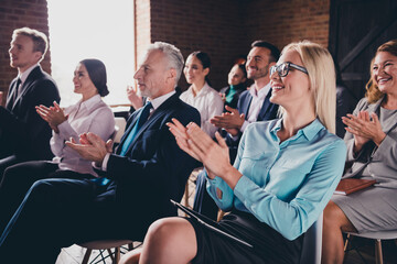 Wall Mural - Photo of cheerful positive hrs sitting boardroom successfully pass training workplace workstation