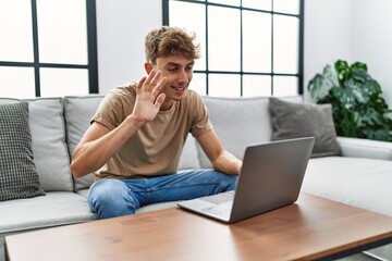 Sticker - Young caucasian man smiling confident having video call at home