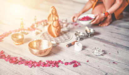 Poster - Beautiful altar with rose petals and goddess statuette. ceremony space.