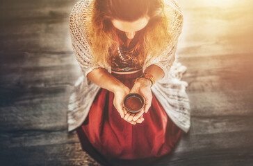 Poster - Cacao ceremony, heart opening medicine. Ceremony space. Cacao cup in woman's hand.