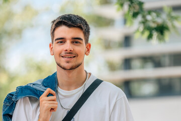 Wall Mural - portrait of young man outdoors