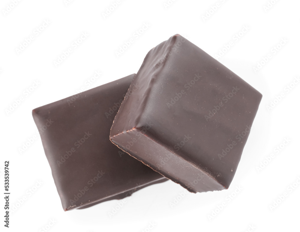 Tasty bird's milk candies on white background