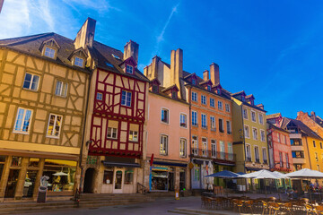 Wall Mural - Summer streets of Chalon-sur-Saone under deep blue sky. View of half-timbered buildings. Saone-et-Loire department, France.