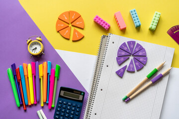 Wall Mural - School supplies, math fractions, pencils, pencils on yellow background. Back to school, education concept background